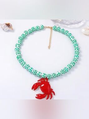 Green Beaded Necklace with Red Crab Charm